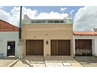 Casa Ocupada em Boa Vista com Terreno Amplo