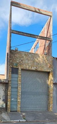 Terreno com Casa Edificada em Suzano - 125m²