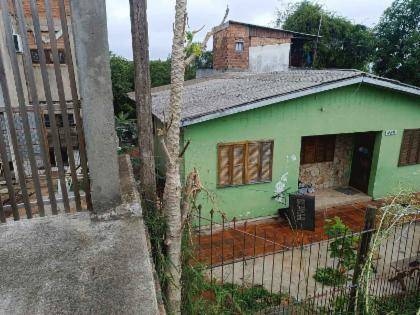 Casa com 187m² construída, ocupada, em Viamão - RS
