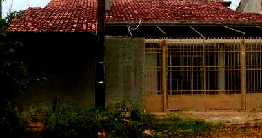 Casa padrão com 2 vagas, 132m² construída, imóvel ocupado