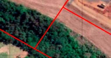 Lote amplo de 42.611 m² desocupado, ideal para investimento