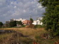 Terreno com quadra poliesportiva 129,74m² construída