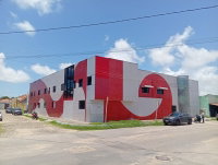 Prédio comercial com 2 pavimentos, 4 apartamentos e área construída