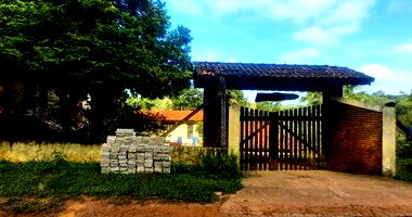 Casa espaçosa com 5 quartos, 5 banheiros e 513.8 m² construída, ocupada