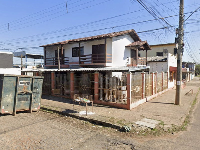 Fração ideal de 50% com casa comercial em São Leopoldo - RS