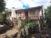 Terreno com casa residencial, 220m²