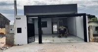Casa residencial com 2 quartos, 1 suíte, 1 wc social, sala, cozinha e churrasqueira