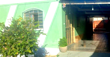 Casa e barracão com terreno de 380,45m² em Nerópolis/GO