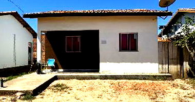 Casa com 2 quartos, varanda, área construída 54,65m², 1 vaga