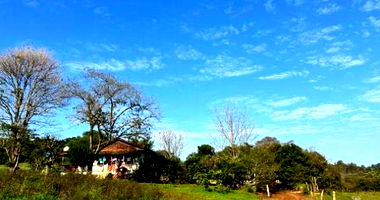 Fração Ideal em Terreno Rural com Edificação em Madeira Precária