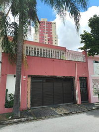 Casa com 3 quartos, 3 banheiros e 5 vagas de garagem