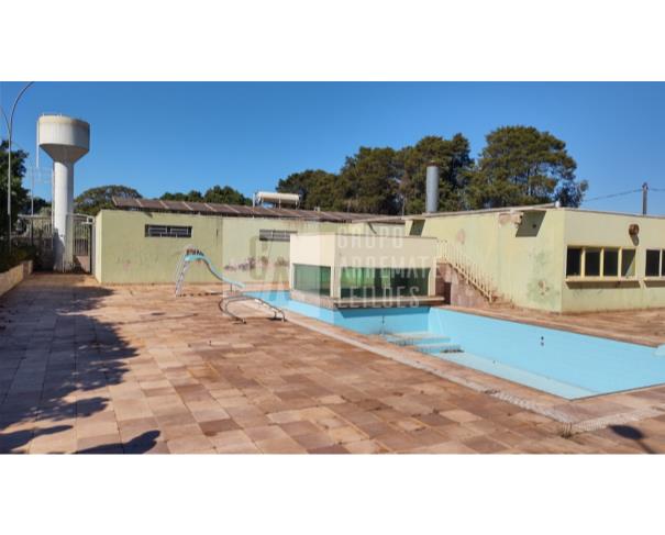 Terreno plano com 5.000m² e 774m² construídos