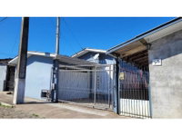 Casa com 1 vaga de garagem, 100m² construídos, ocupada