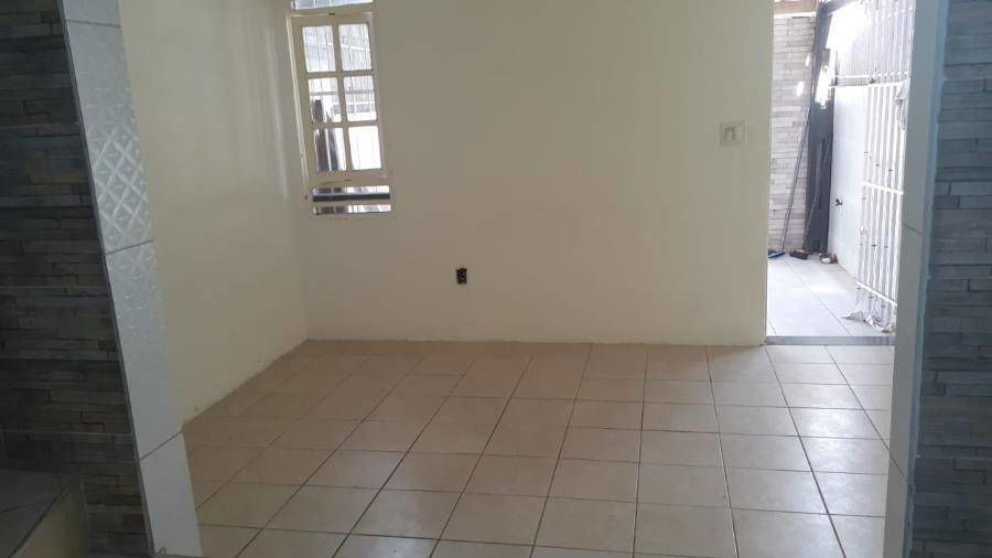 Casa com 3 quartos, 2 banheiros e 1 vaga, 84m² construída