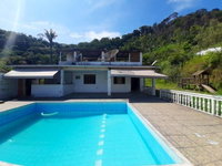 Casa Ocupada com 2 Quartos em Magé/RJ