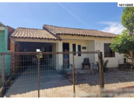 Casa com 2 quartos, 1 banheiro e garagem, 70,20m², ocupada