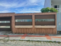 Terreno com duas edificações em Imbituba