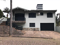 Casa com 3 quartos, 127,7 m², ocupada, 1 vaga de garagem