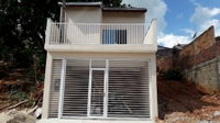 Casa com 2 quartos, 2 banheiros e 1 vaga de garagem