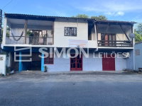 Terreno com prédio comercial e 2 apartamentos em Guaramirim/SC