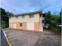 Casa com 243,40m² de terreno e 235,00m² construída, ocupada