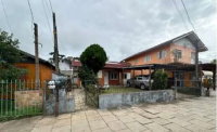 Casa com 64m², 2 quartos, 1 banheiro, ocupada, área total 330m²