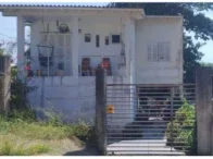Casa ocupada com 127,86m² e terreno de 330m²