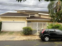 Casa com 390 m² de área construída, ocupada, ideal para investimento