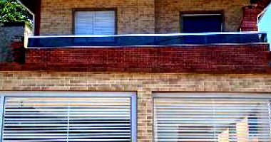 Casa em Praia Grande/SP com 2 Quartos e 1 Vaga