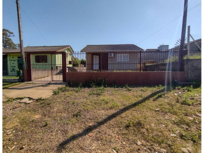 Casa ocupada com 133,38 m² e terreno de 396,34 m²