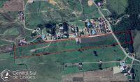 Terreno amplo de 126.500m² com relevo plano e infraestrutura parcial