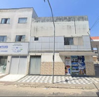 Terreno urbano com 466,94 m², 2 salas comerciais e apartamento 2 quartos