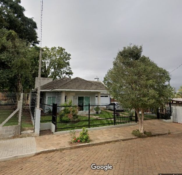 Terreno urbano com edificação 156m² no Centro, 600m² total