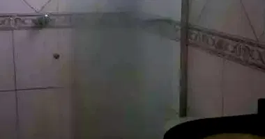 Casa Ocupada com 1 Vaga e Varanda em Praia Grande