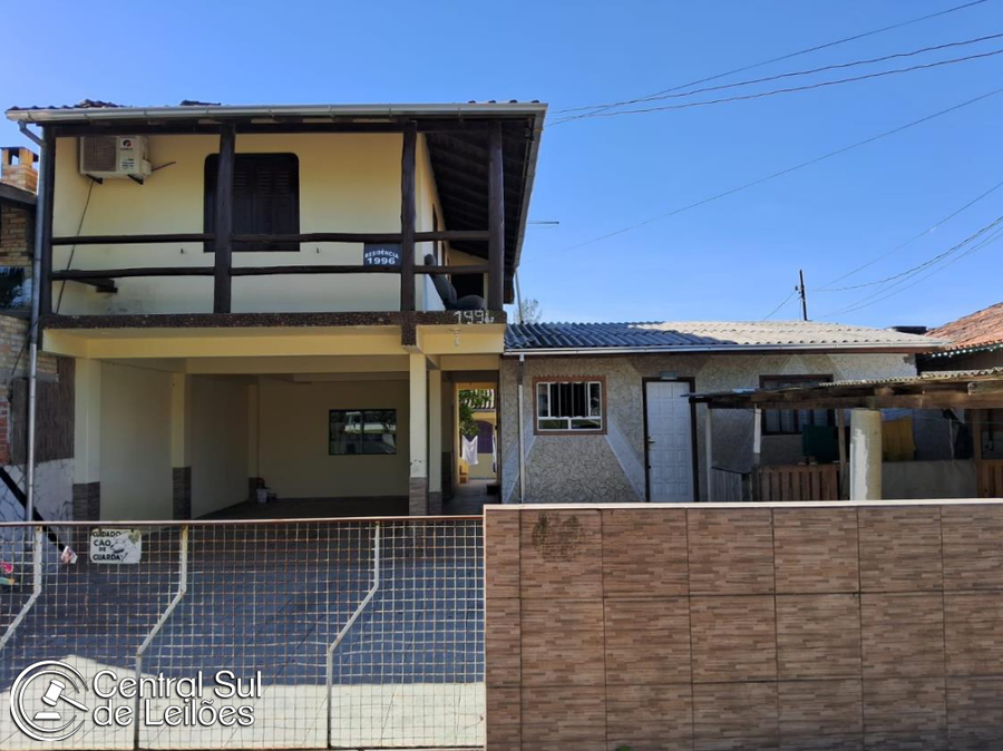 Terreno 390m² com 3 edificações menores para locação