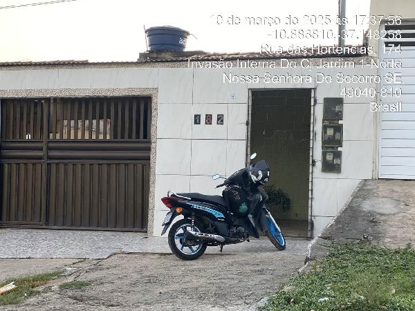 Casa com 2 quartos, varanda, área construída 58,3 m², 1 vaga