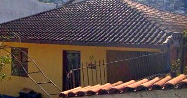 Casa residencial 57 m² com 256 m² de terreno, ocupada
