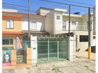 Sobrado com 129m² de Área Construída em Leilão