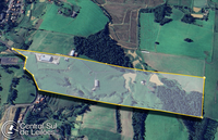 Terreno rural com edificações industriais e residenciais