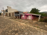 Casa com 153m², 3 quartos, ocupada, ideal para investimento