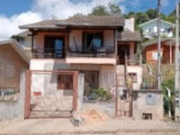 Casa com 4 quartos em Flores da Cunha/RS