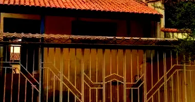 Casa padrão com 100m² construída, imóvel ocupado