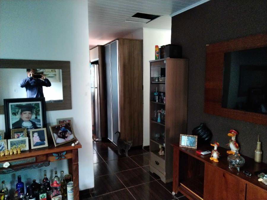 Casa com 3 quartos, 2 banheiros, 2 vagas, 214m² construída, ocupada