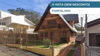 Casa com 3 quartos, 2 banheiros e 1 vaga, 209m² construída, ocupada