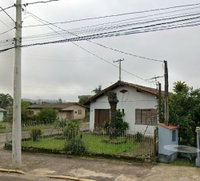 Terreno urbano com residência de 54m²