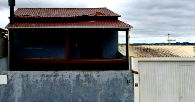 Casa residencial com 70m² construída, imóvel ocupado