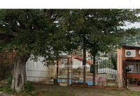 Terreno de 250m² com chalé de madeira