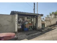 Casa ocupada com 110,72m² construída e 218m² de terreno