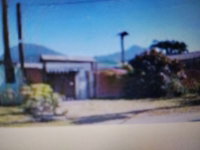 Terreno 248m² com Residência em Matinhos - Oportunidade Única!