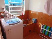 Casa com 3 quartos, 2 banheiros e 137m² construída, ocupada